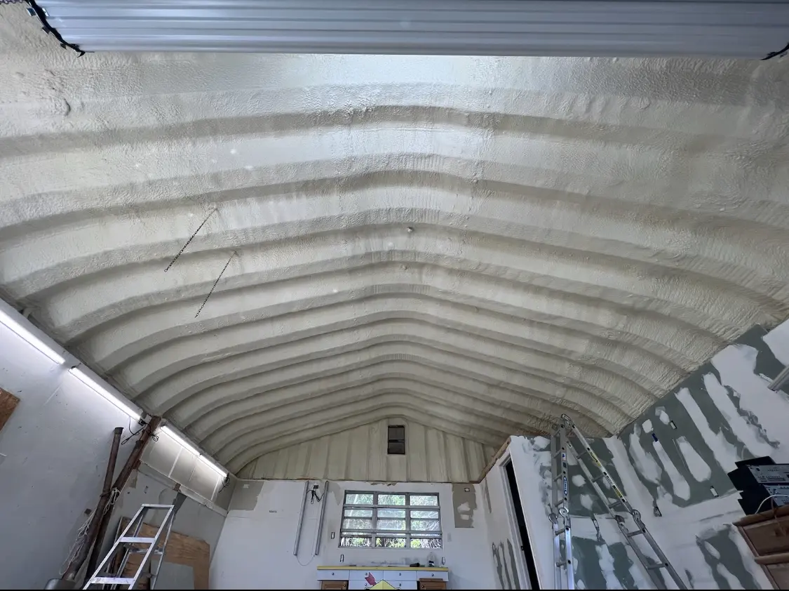 Spray polyurethane foam applied to the underside of a metal roof deck in Alsip